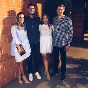 White eyelet long sleeve dress with scalloped hem